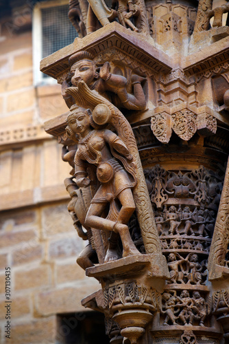 Bracket design with divine dancer on the columns of Shri Mahaveer Jain temple, Jaisalmer Fort, Jaisalmer, Rajasthan, India