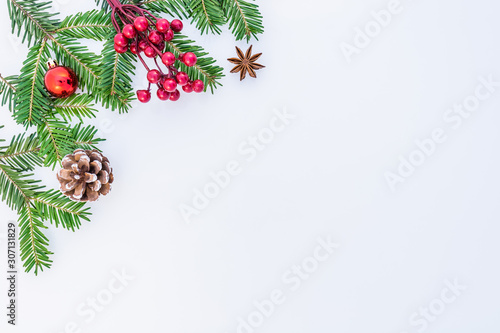Christmas background with decorations, fir branches and space for text.