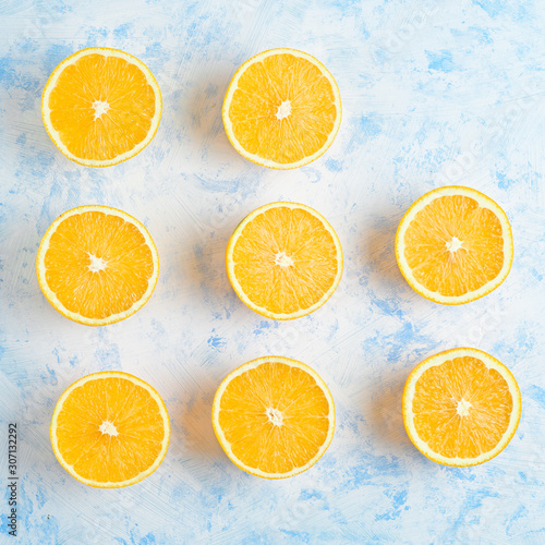 Healthy food, background, halves of oranges sliced for making orange juice