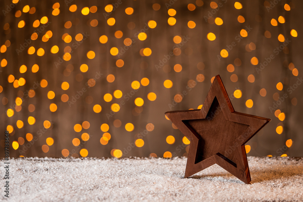custom made wallpaper toronto digitalHandmade wooden star standing on table covered with snow. Selective focus
