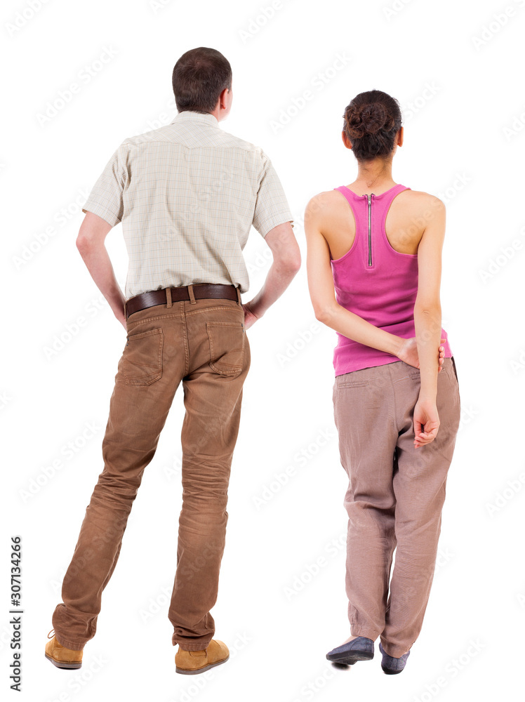 Back view of couple. beautiful friendly girl and guy together. Back view of couple. beautiful friendly girl and guy together.