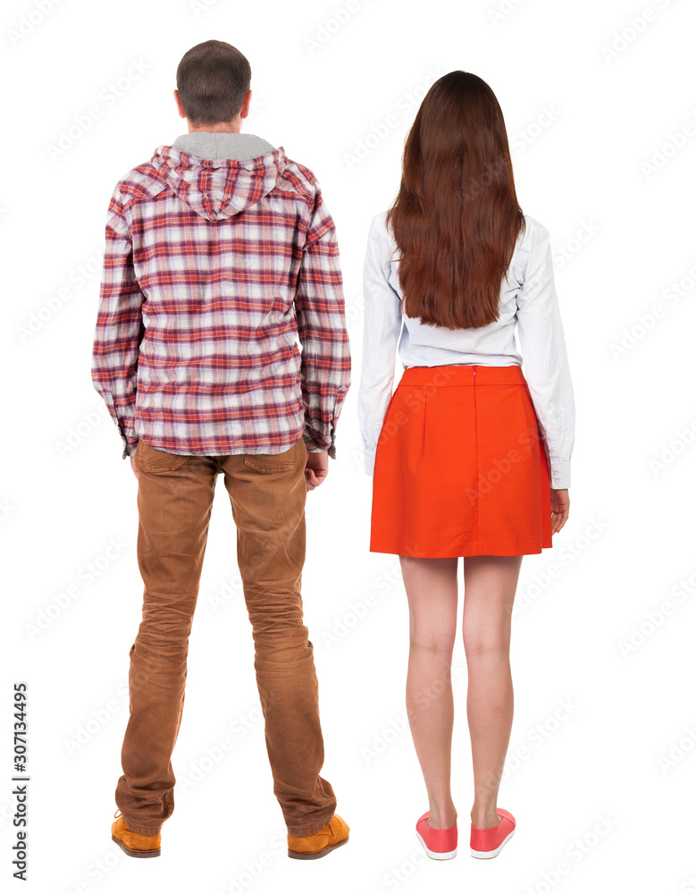 Back view of couple. beautiful friendly girl and guy together. Back view of couple. beautiful friendly girl and guy together.