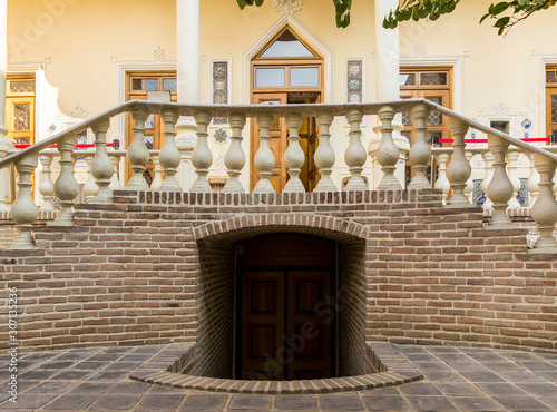 Courtyard basement entrance, Moghadam historic house museum, Tehran, Iran photo