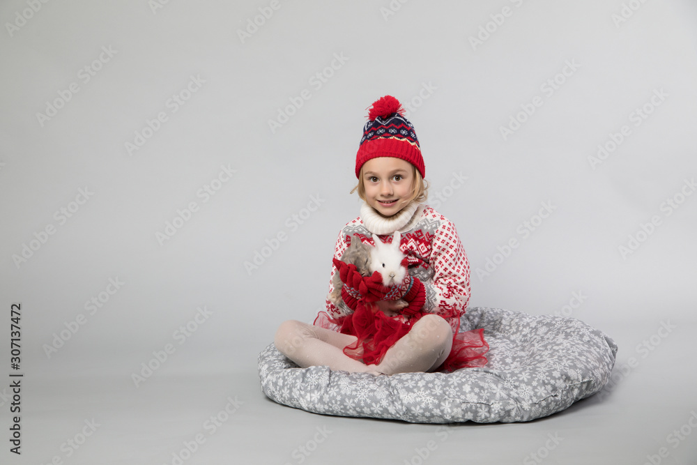 Little girl in winter look. Christmas concept. Little girl in winter look. Christmas concept.