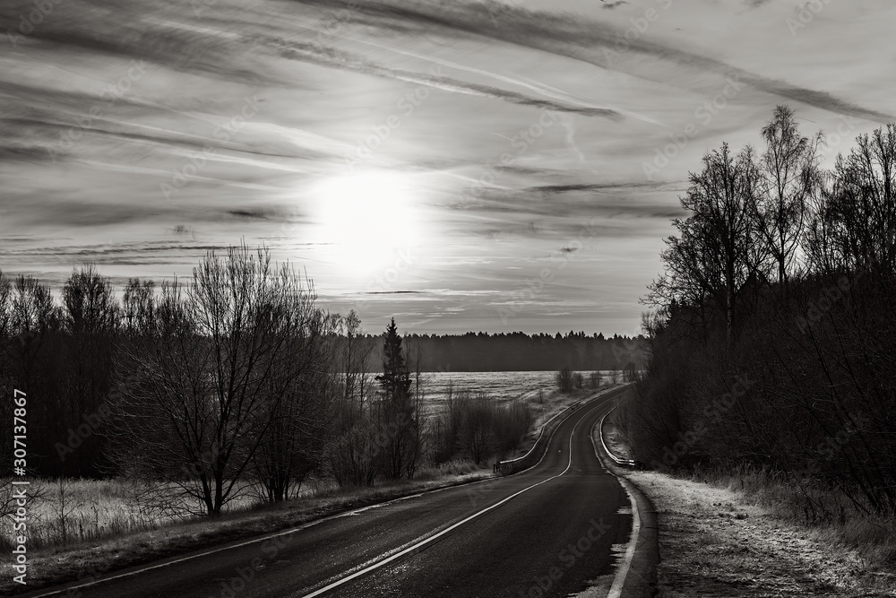 black and white photo landscape road at sunset
