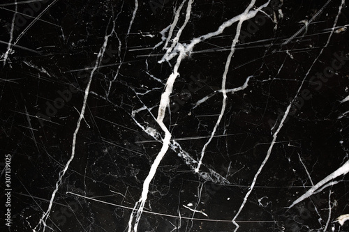 Patterned structure of black marble pattern (Black Italy) for design. Abstract marble background.