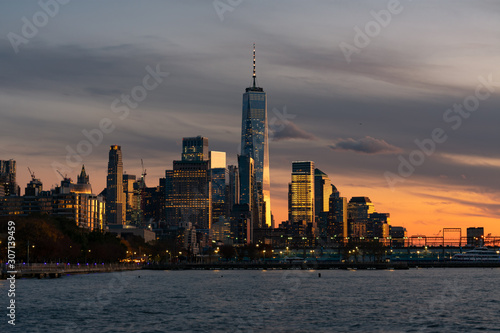 Skyline of the New York City Financial District along the Hudson River during a Sunset