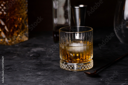 selective focus, alcoholic drink in a low glass, bar