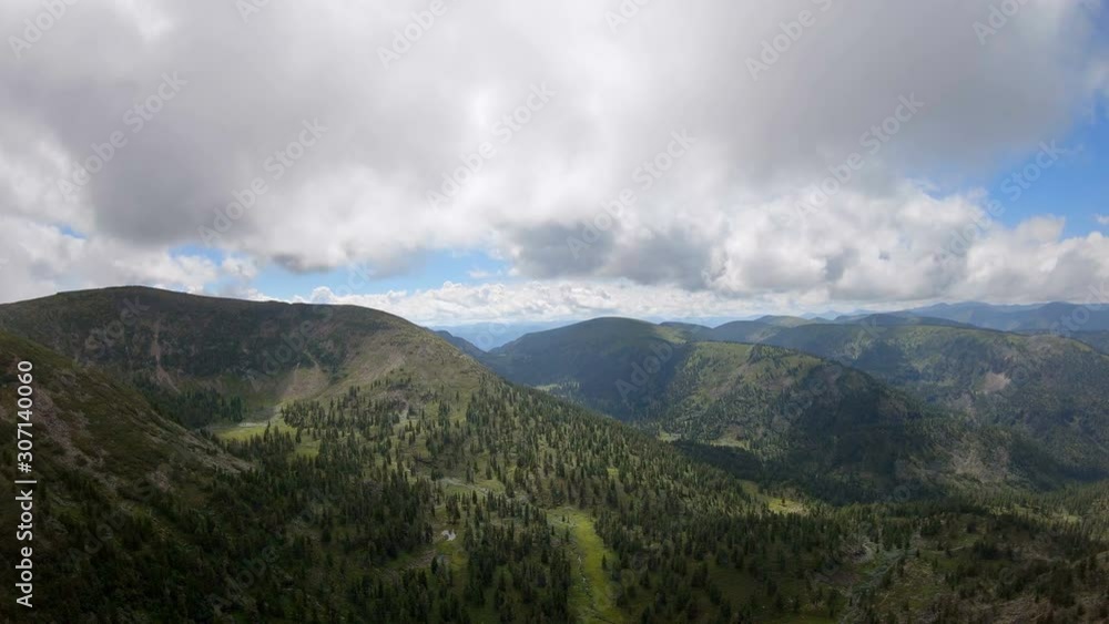 Panorama of mountain scenery. Aerial view. Panning of beautiful mountain landscape. Pan 4K Panorama of mountain scenery. Aerial view. Panning of beautiful mountain landscape. Pan 4K