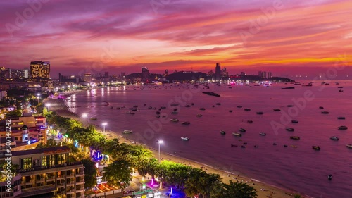 4K Timelapse Aerial top view of of Pattaya beach in the evening and beautiful sunset sky 