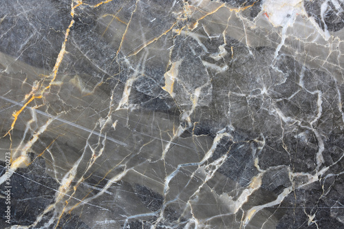 Patterned natural of dark gray marble pattern (Russia Gold) background for design. © ImagineDesign