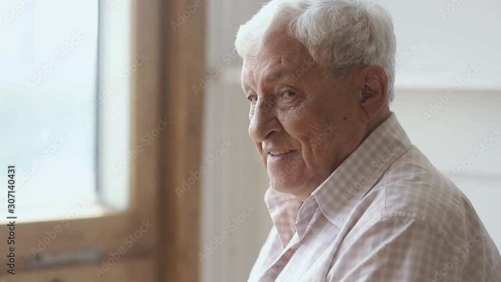 Happy 80s older grandfather waiting for grown up children visit. Happy 80s older grandfather waiting for grown up children visit.