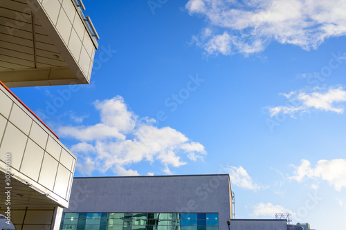 Photo of a beautiful blue sky on a sunny clear day on the background of the building