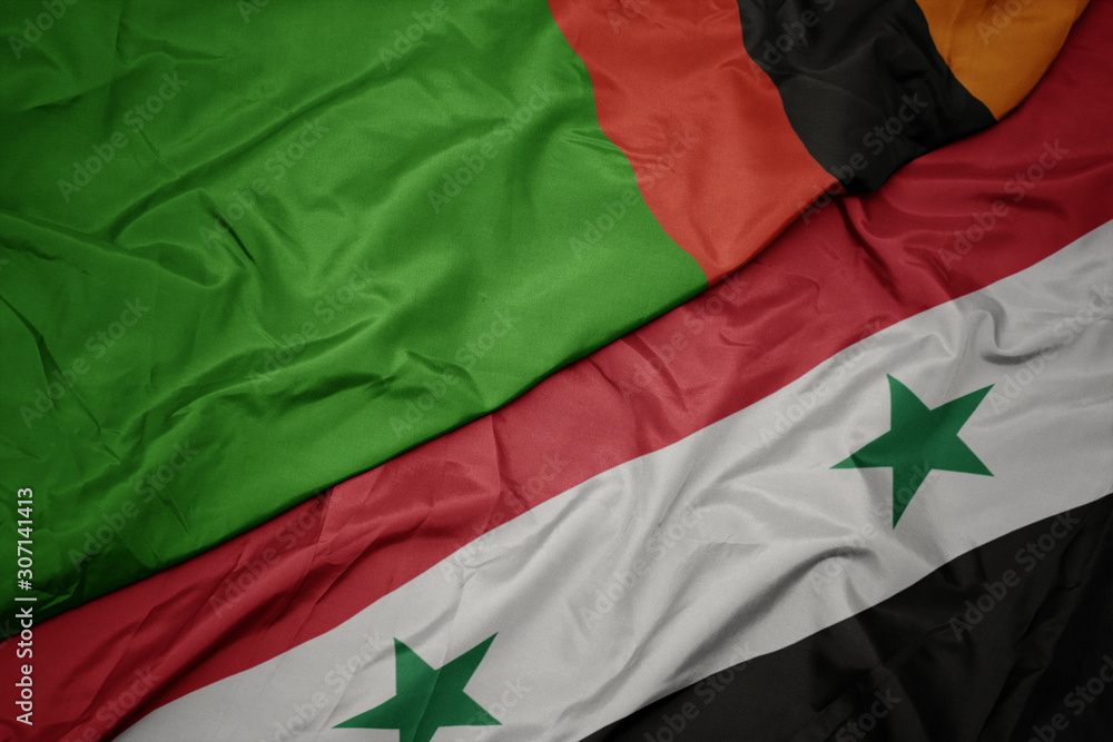 waving colorful flag of syria and national flag of zambia. waving colorful flag of syria and national flag of zambia.