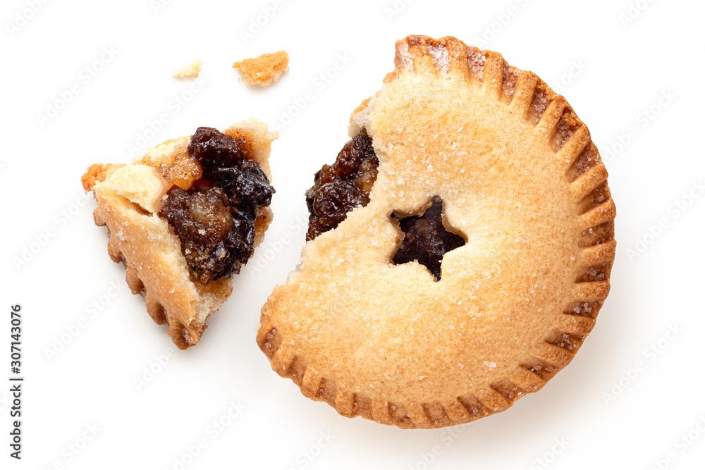 Broken open traditional british christmas mince pie with fruit filling isolated on white. Top view. - obrazy, fototapety, plakaty 
