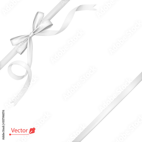 Silver or white ribbon with bow tied to corner with a knot. Gift.