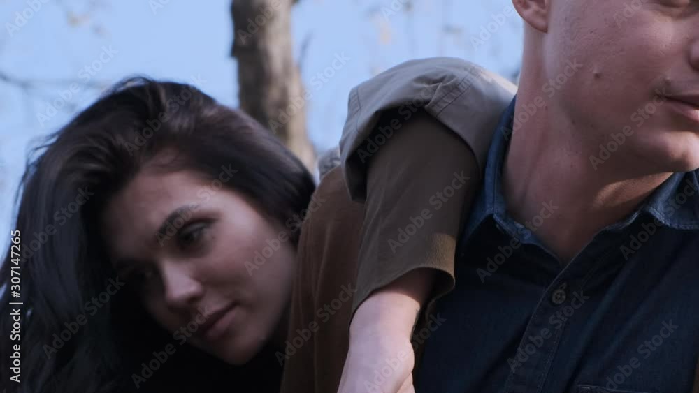 Young beautiful couple outdoor on sunset, laughing, hug, kiss Fashion love story. Slow motion 4K Young beautiful couple outdoor on sunset, laughing, hug, kiss Fashion love story. Slow motion 4K
