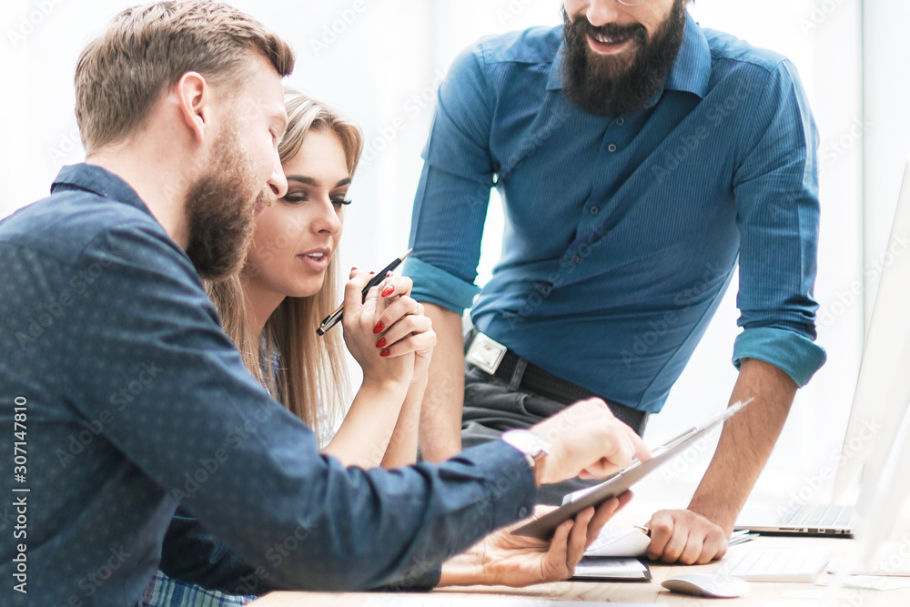close up. a group of business people discussing ideas for a new startup close up. a group of business people discussing ideas for a new startup