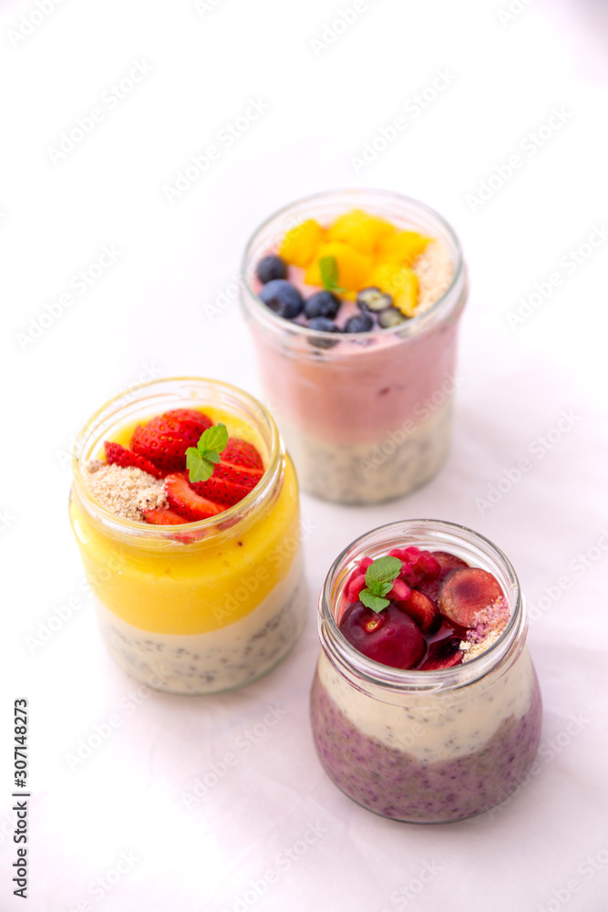 Chia pudding and fresh fruit smoothie, mango, berry, cherry Chia pudding and fresh fruit smoothie, mango, berry, cherry