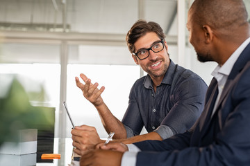 Businessman discussing project with colleague