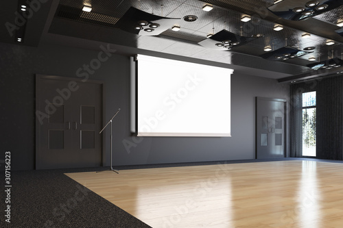 Projection hall with projection screen on stage. Art gallery. Free space for advertising.