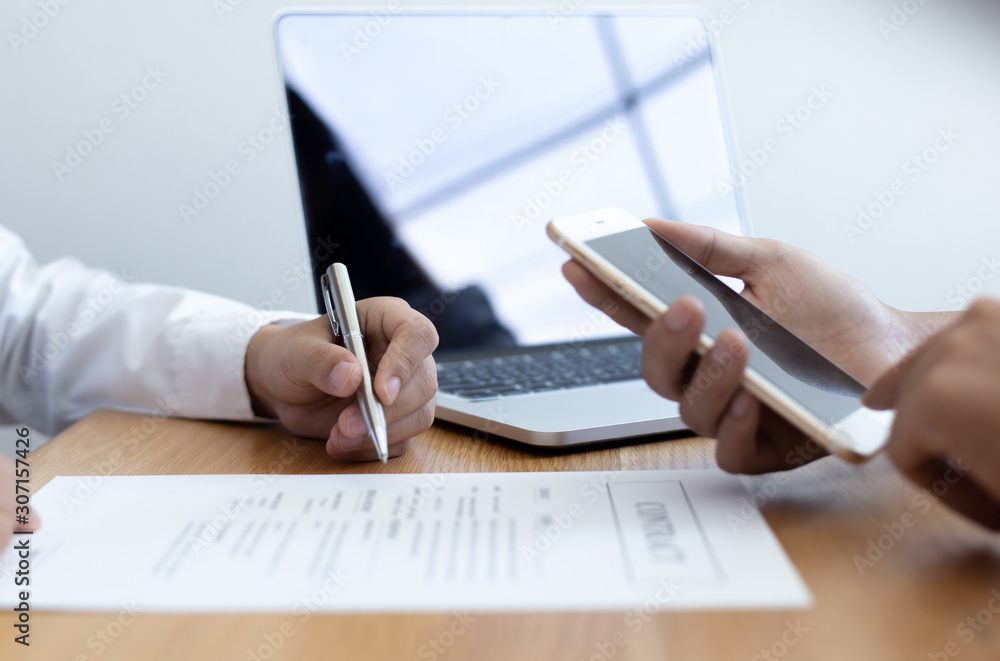Business people negotiate for customers to sign land sales contracts, Property purchase contract of concept.. Business people negotiate for customers to sign land sales contracts, Property purchase contract of concept..