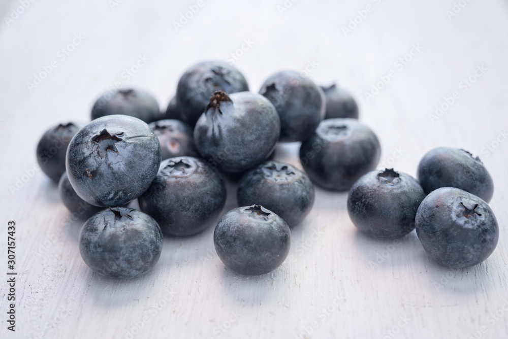 blueberries on wood white background blueberries on wood white background