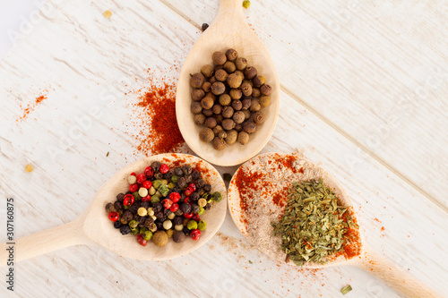 Mixed spices on the wooden spoons