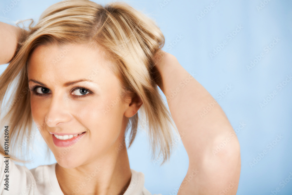 Portrait of an young happy blond woman Portrait of an young happy blond woman