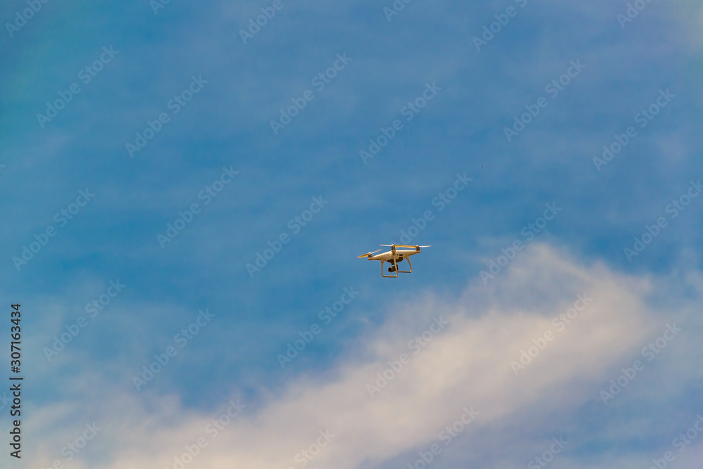 Drone Flying at Clean Blue Sky Drone Flying at Clean Blue Sky