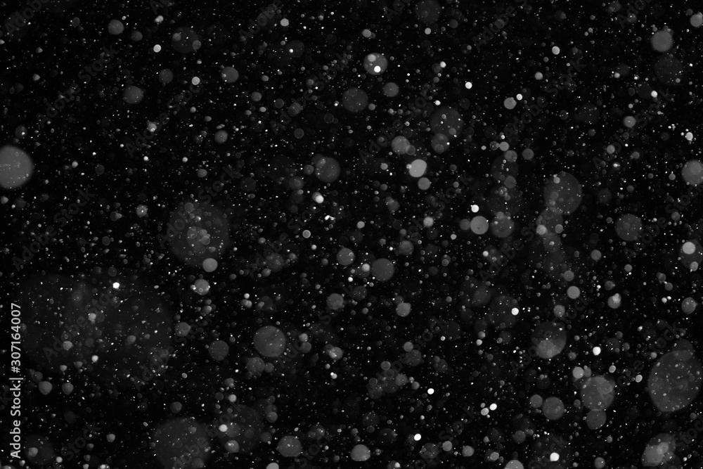 Fototapeta premium closeup background texture of snowflakes during a snowfall
