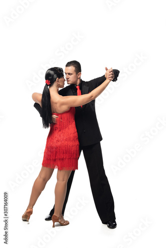 expressive, stylish couple of dancers performing on white background