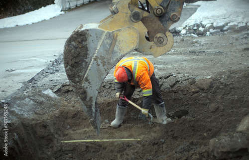 Tablou pe pânză construction worker shovel road repair drain sewer work excavation digger