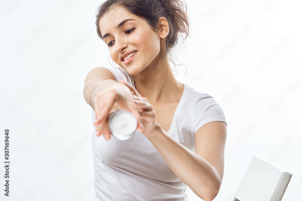 young man holding a glass of water
