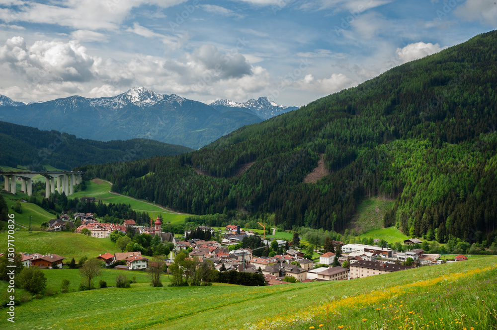 A glorious Alpine landscape overlooking a small village in Tyrol