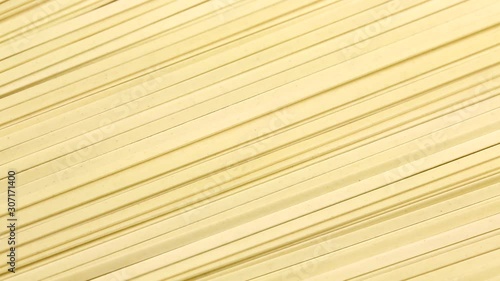 Udon noodles in a circular motion. closed