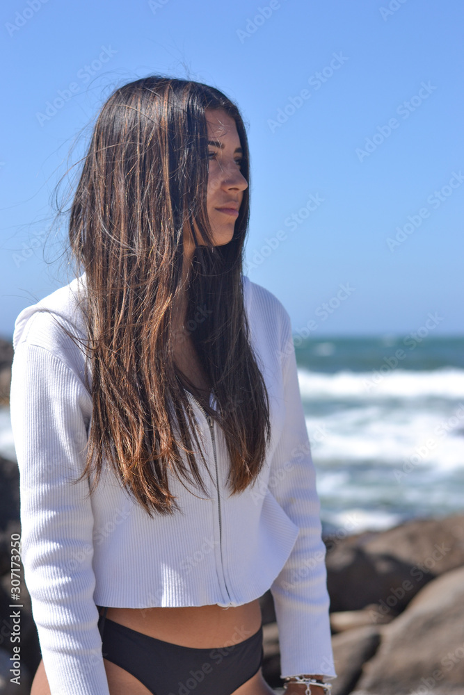 Young woman portrait at the sea side, summer time Young woman portrait at the sea side, summer time