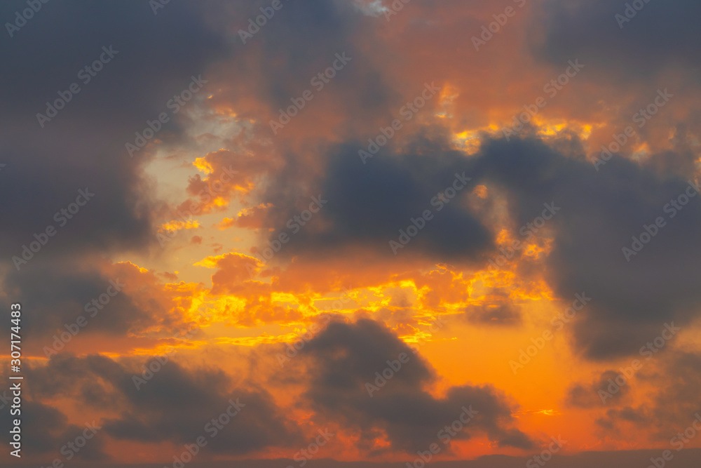 Beautiful vibrant sunset with dramatic clouds