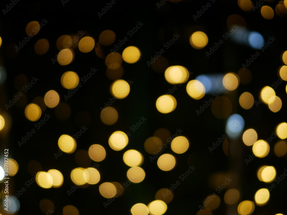 Golden blurry bokeh background and copy space,wallpaper,backdrop