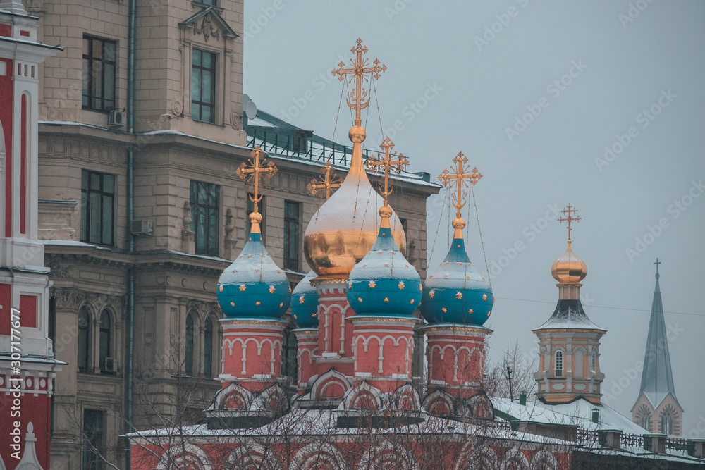 Fototapeta premium Winter in Red Square, heavy snow clouds