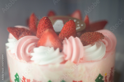 Fotografie, Obraz Fresh strawberry topping over whipping cream on cake