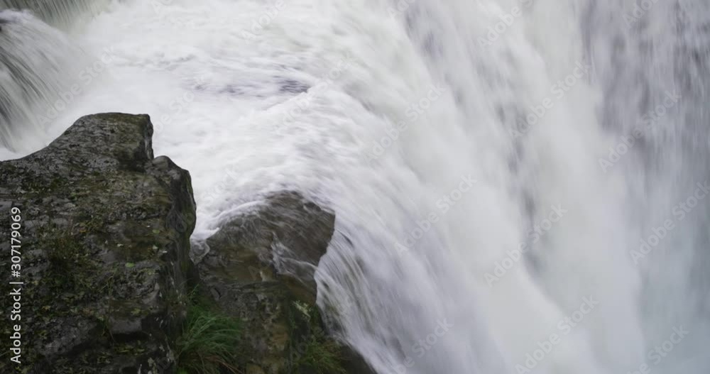 Dramatic and impressive Shifen Waterfall in the north of Taiwan, ROC. A cloudy day with a lot of water vapor. Dramatic and impressive Shifen Waterfall in the north of Taiwan, ROC. A cloudy day with a lot of water vapor.