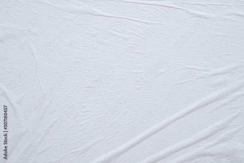 Blank white crumpled and creased paper poster texture background Blank white crumpled and creased paper poster texture background