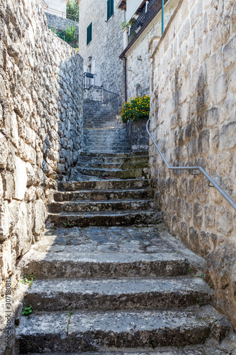 stone stairs on a narrow street in the town of Perast, Montenegro © Дмитрий 