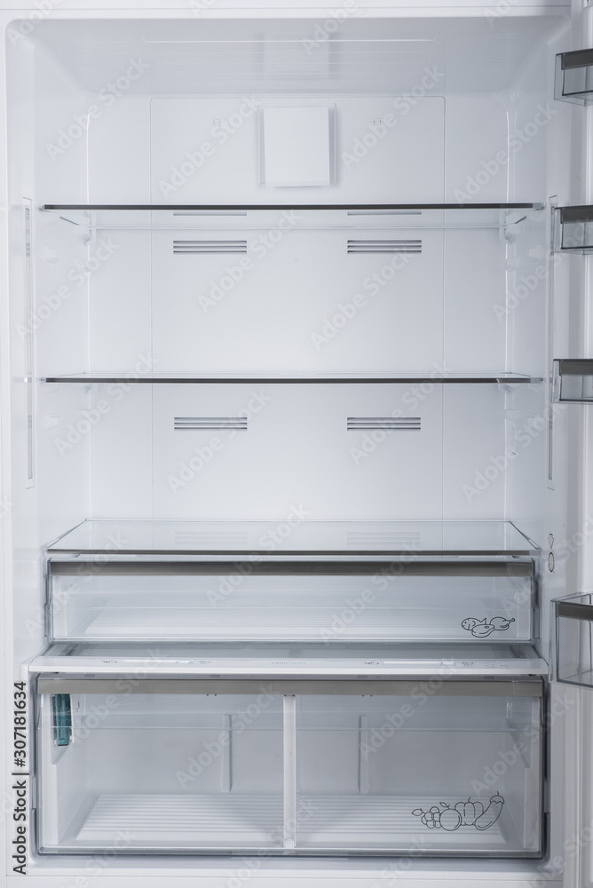 Fototapeta premium Refrigerator Isolated on White Background. Modern Kitchen and Domestic Major Appliances