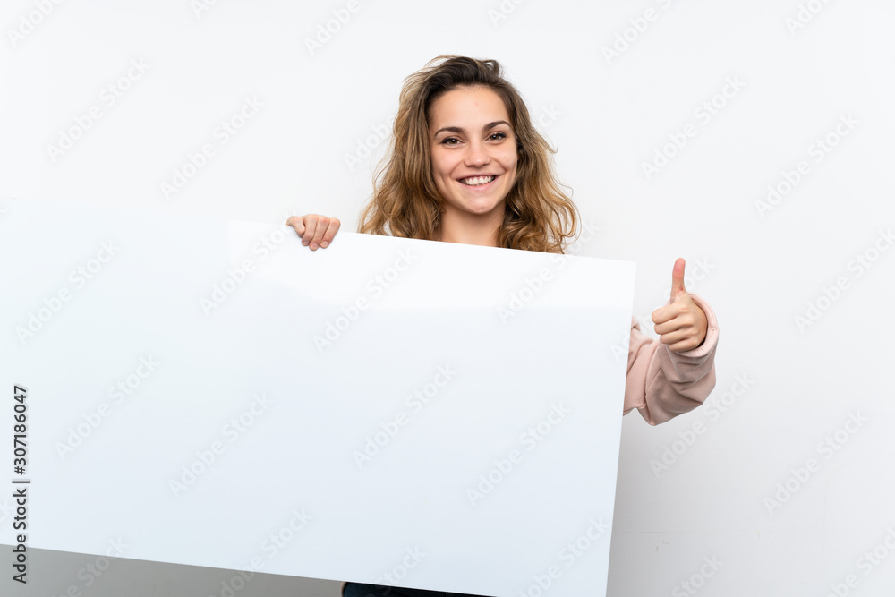 Young blonde woman holding an empty white placard for insert a concept Young blonde woman holding an empty white placard for insert a concept