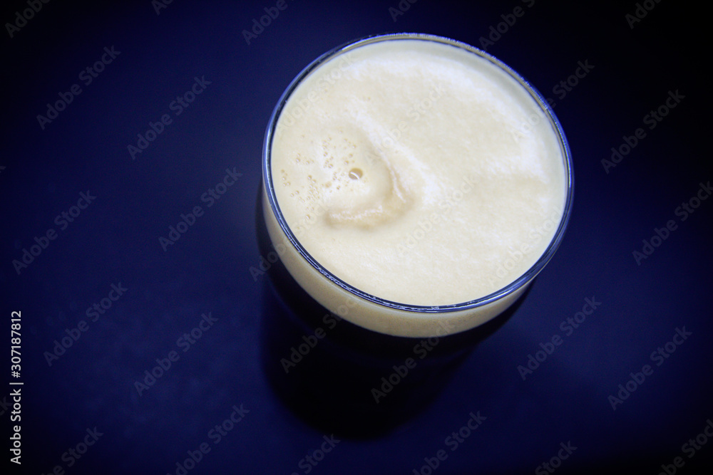 Black beer on black background Black beer on black background