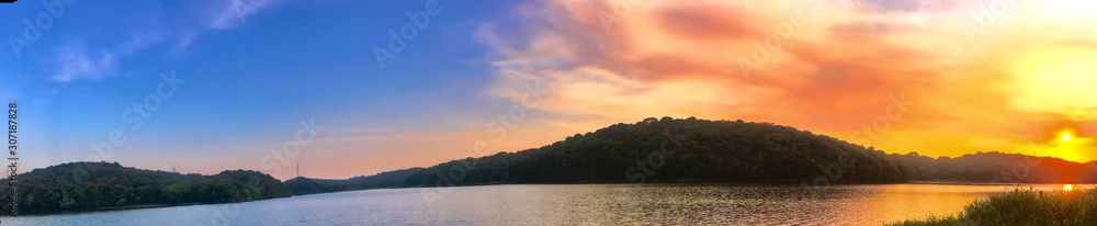 panoramic sunset over the lake
