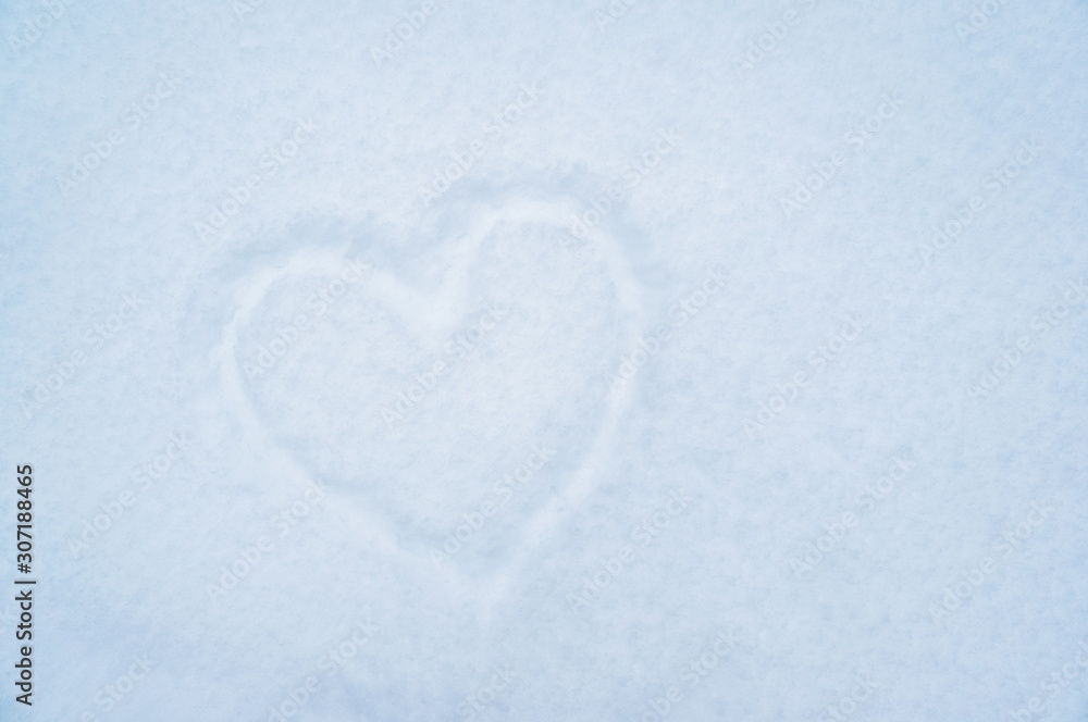 Heart shape In Snow on Sunny day. Copy space