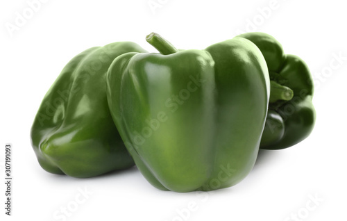 Ripe green bell peppers isolated on white